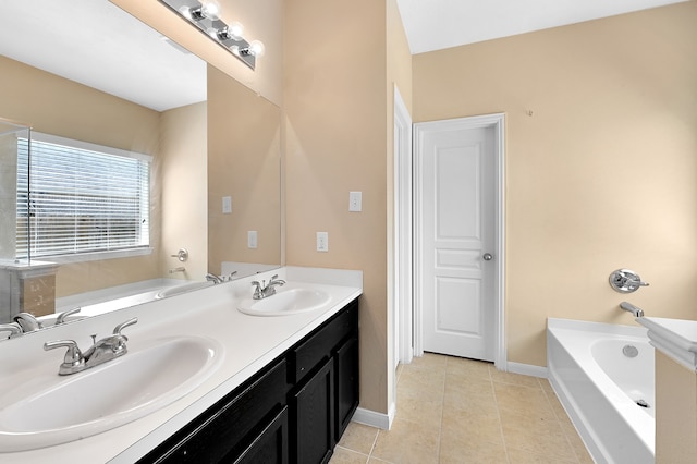 bathroom with dual bowl vanity, tile floors, and a bath to relax in