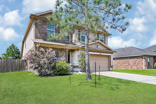 view of front of home featuring a garage and a front lawn