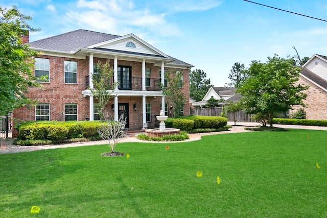 view of front of home with a front yard