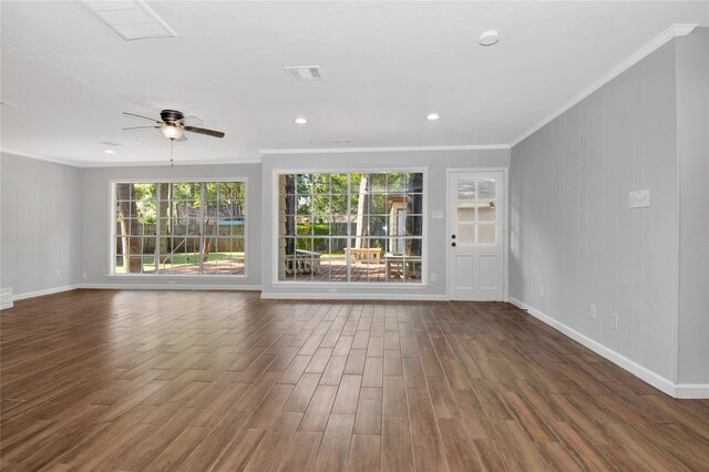 427 Pebblebrook Dr, El Lago, TX 77586 - empty room featuring dark wood-type flooring, ornamental molding, and ceiling fan