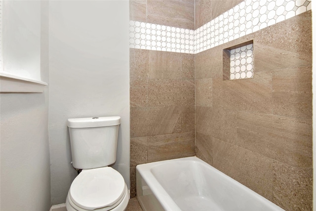 427 Pebblebrook Dr, El Lago, TX 77586 - bathroom featuring tiled shower / bath and toilet
