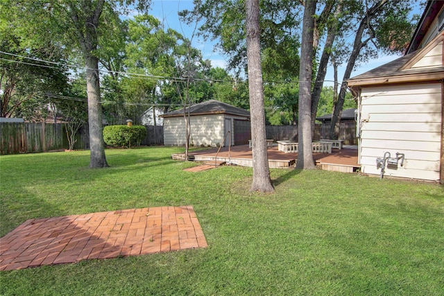 427 Pebblebrook Dr, El Lago, TX 77586 - view of yard with an outdoor structure and a deck