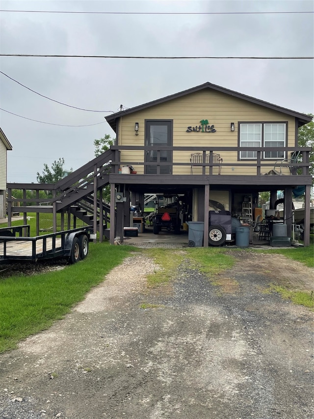 view of front of home featuring a carport