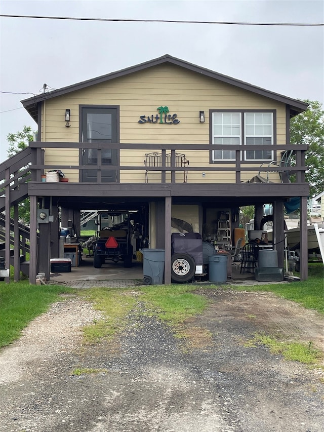 view of front of house with a carport