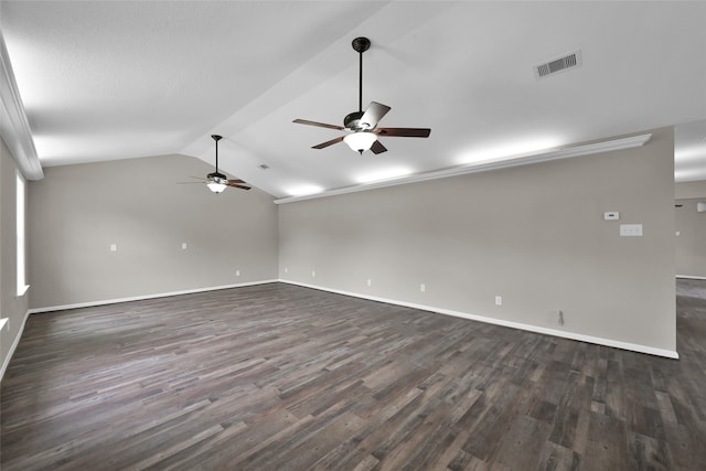 unfurnished room with dark hardwood / wood-style floors, ceiling fan, and vaulted ceiling