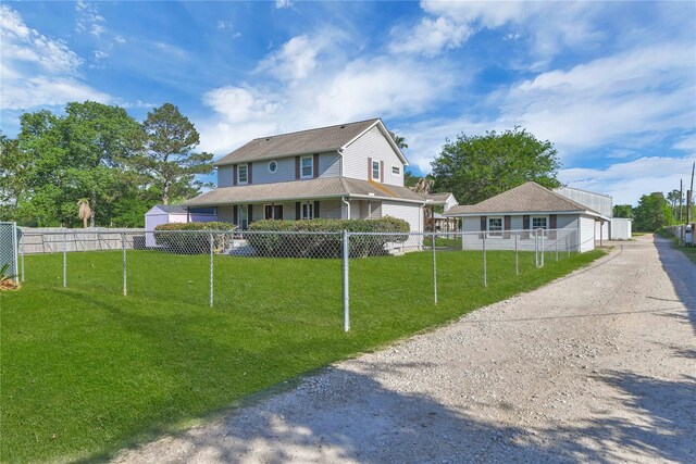 view of front of home with a front lawn