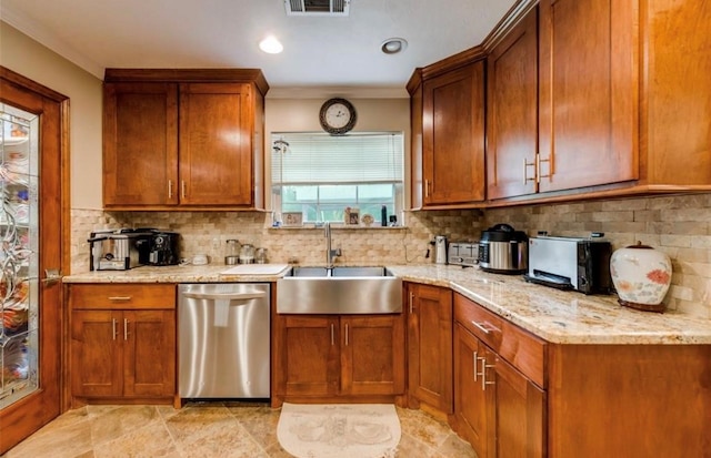 kitchen featuring stainless steel dishwasher, backsplash, and a wealth of natural light