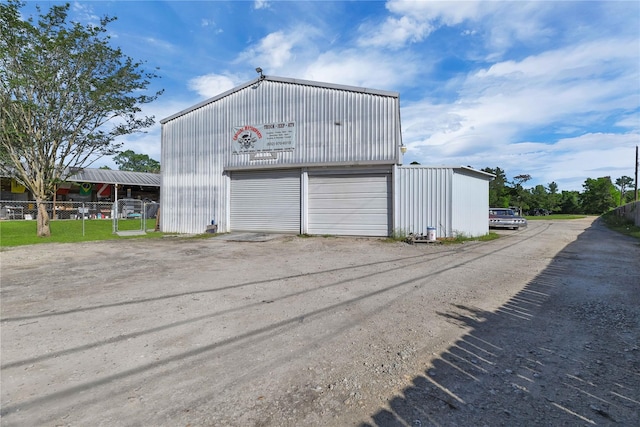 view of outdoor structure with a garage