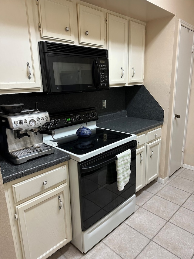 kitchen featuring backsplash, white cabinetry, light tile flooring, and white range with electric stovetop