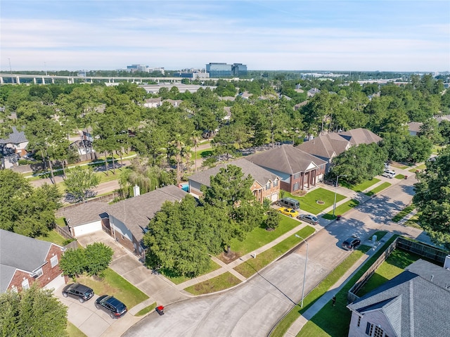 birds eye view of property with a residential view