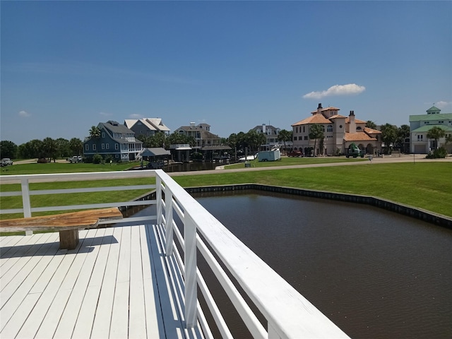 exterior space featuring a lawn and a residential view