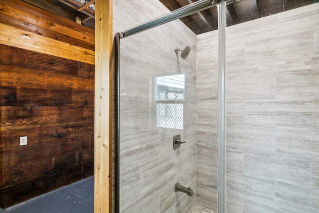 bathroom with a shower with shower door