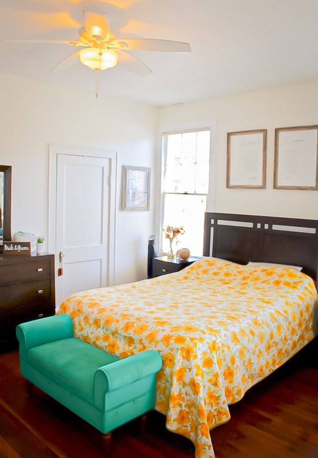 bedroom featuring ceiling fan and hardwood / wood-style floors