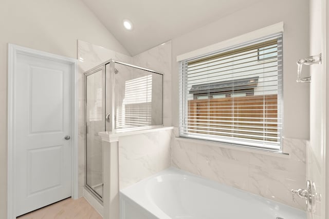 bathroom with plus walk in shower and vaulted ceiling