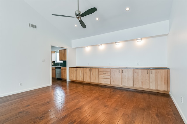 spare room with dark hardwood / wood-style flooring, high vaulted ceiling, ceiling fan, and sink