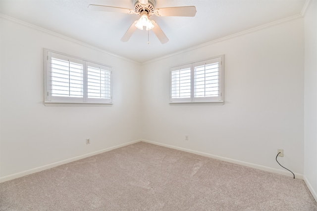 unfurnished room featuring carpet flooring, plenty of natural light, ceiling fan, and ornamental molding