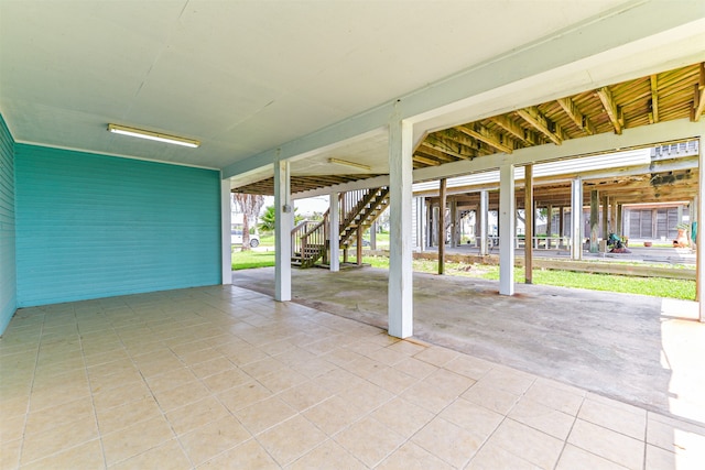 view of patio / terrace with a carport