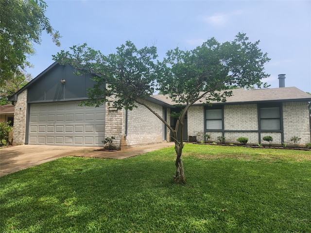 ranch-style house featuring a garage and a front yard