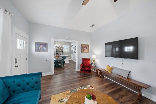 living room with dark wood-type flooring