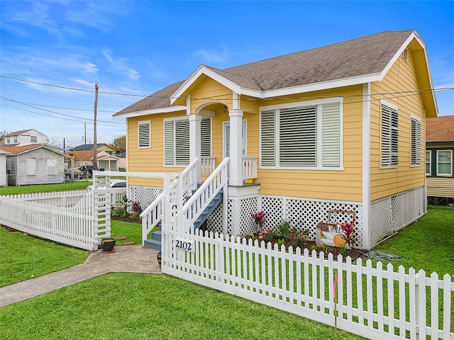 view of front of house with a front yard