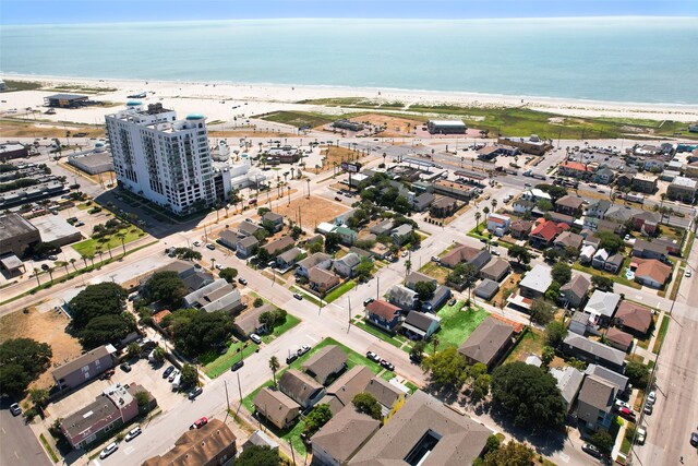 bird's eye view with a beach view and a water view