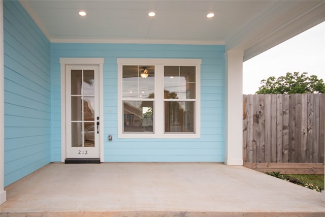 entrance to property featuring a patio