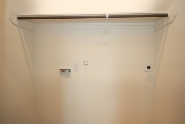 laundry room featuring washer hookup and electric dryer hookup