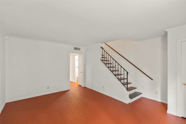 interior space featuring crown molding