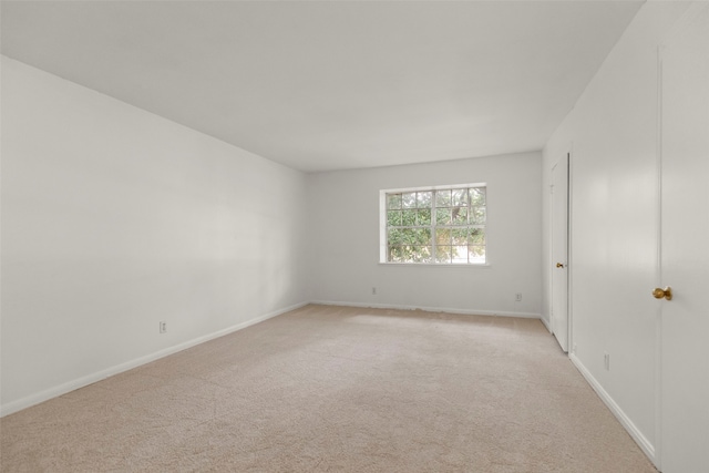 unfurnished room featuring carpet floors