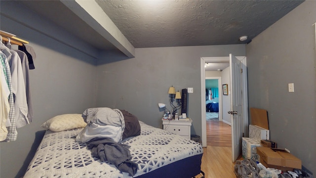 bedroom featuring light hardwood / wood-style floors