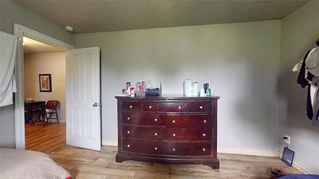 bedroom featuring light hardwood / wood-style flooring