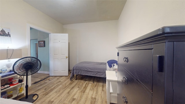 bedroom with light wood-type flooring