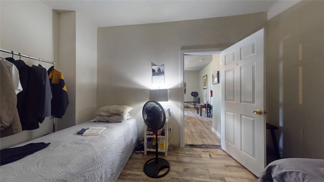 bedroom with light wood-type flooring