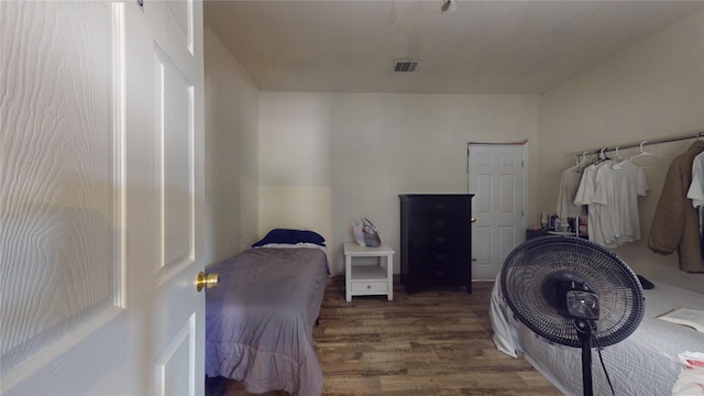 bedroom featuring hardwood / wood-style floors