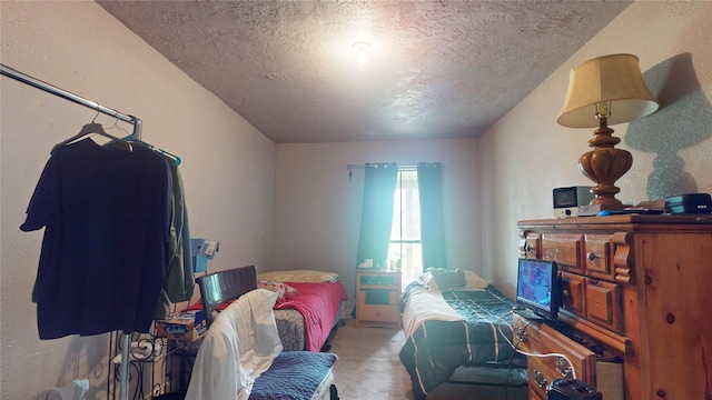 interior space with a textured ceiling