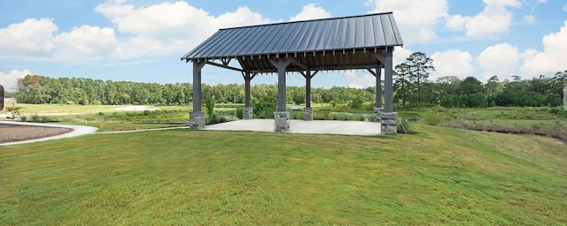 view of community with a gazebo and a yard