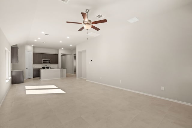 unfurnished living room featuring ceiling fan