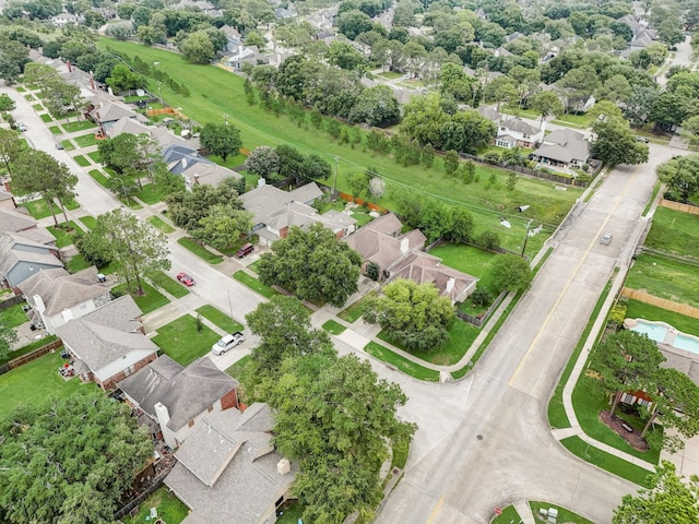 birds eye view of property with a residential view