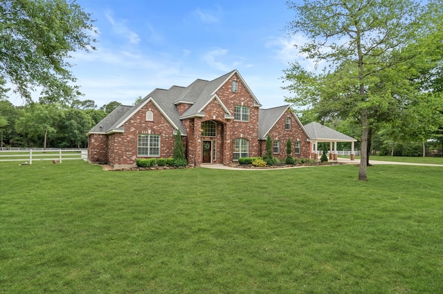 view of front of property with a front lawn