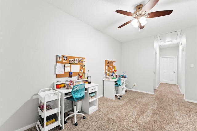 carpeted home office with ceiling fan