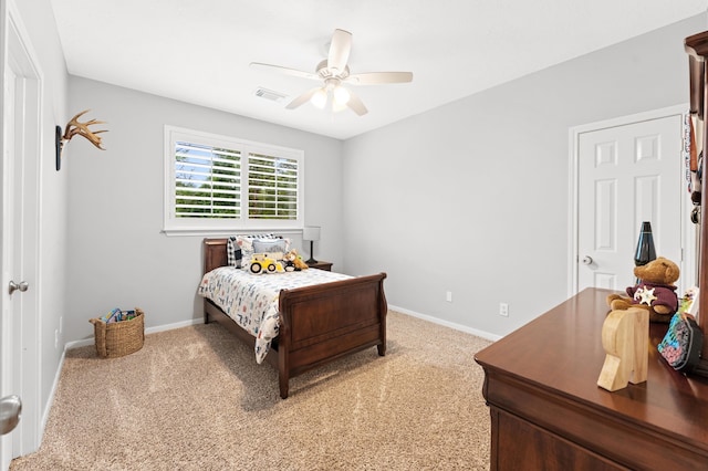 bedroom with ceiling fan and carpet floors