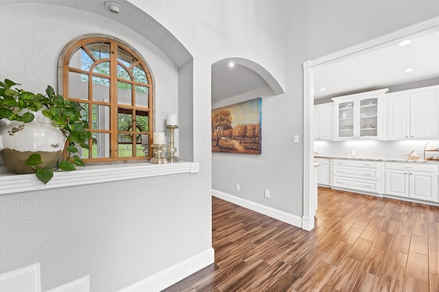 hall featuring wood-type flooring