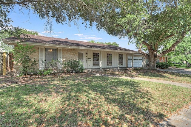 ranch-style house with a front yard