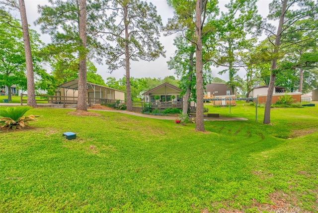 view of yard featuring a lanai