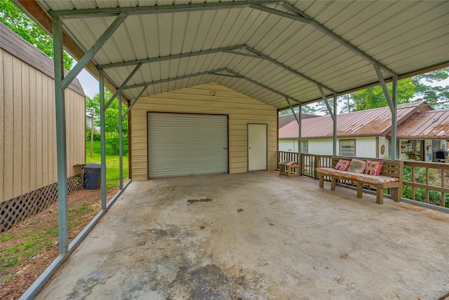 garage featuring a carport