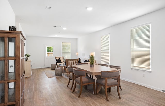 dining room featuring light hardwood / wood-style floors