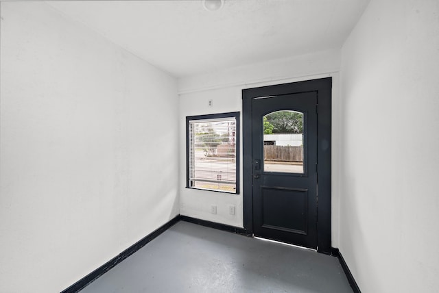 entryway with concrete floors