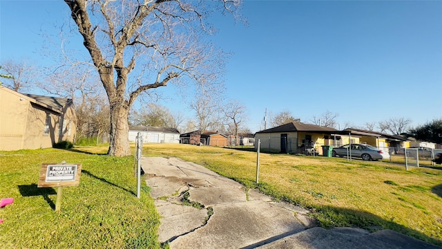 ranch-style home featuring a front yard and a carport