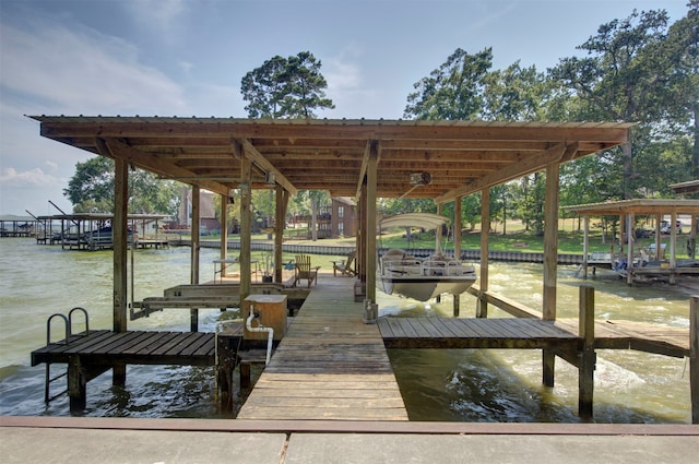 view of dock with a water view