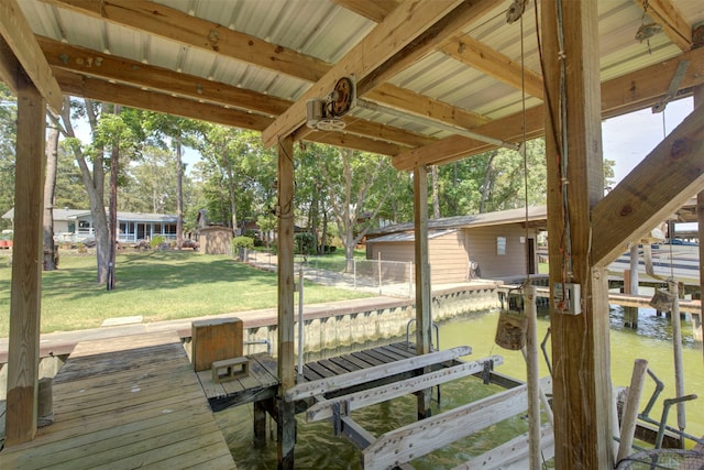 dock area featuring a yard